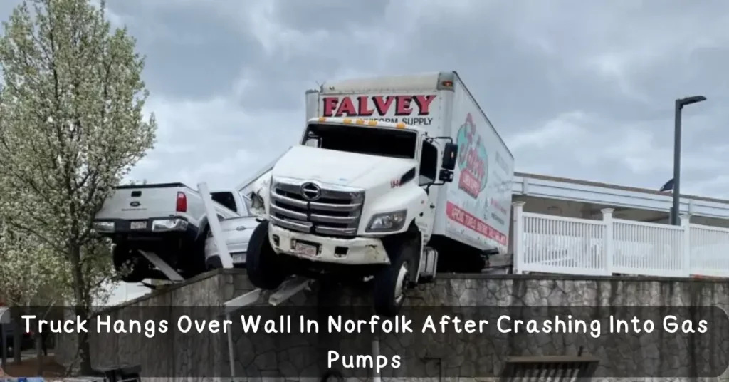 Truck Hangs Over Wall In Norfolk After Crashing Into Gas Pumps