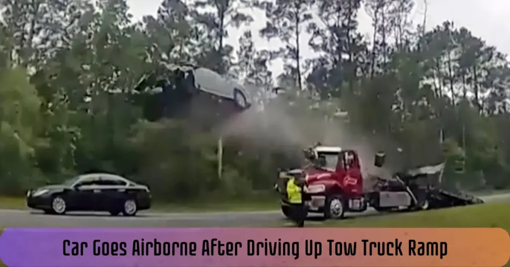 Car Goes Airborne After Driving Up Tow Truck Ramp